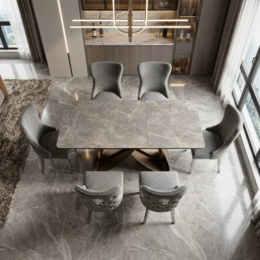 Luvon Cheshire Extending Ceramic Dining Table Set with 6 Grey Velvet Lion Head Knocker Chairs and Silver Chrome Legs