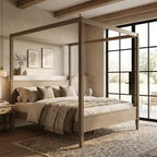 A rustic four-poster canopy bed with a light natural wood frame, styled with neutral beige bedding