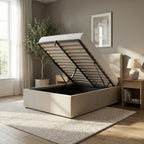 Beige bed with storage compartment in a bedroom setting
