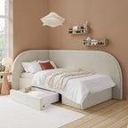 Beige upholstered bed with storage drawers in a bedroom setting.