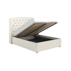 Beige upholstered bed with open storage compartment on a white background