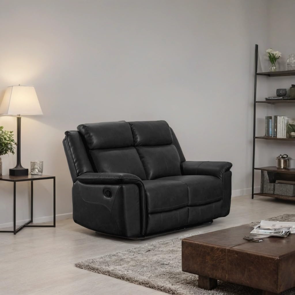 Black leather recliner sofa in a living room setting with a lamp, coffee table, and shelves.