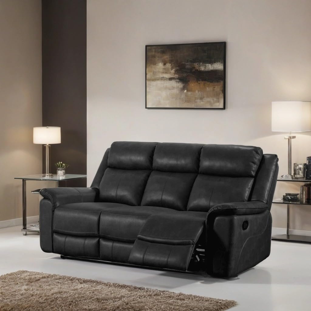 Black leather sofa in a living room setting with lamps and a painting.