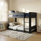Bunk bed in a room with a rug and books on a shelf.