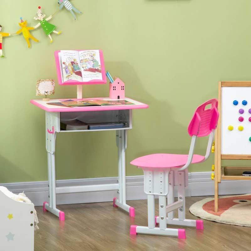 Children's desk and chair set with a green wall and toys in the background
