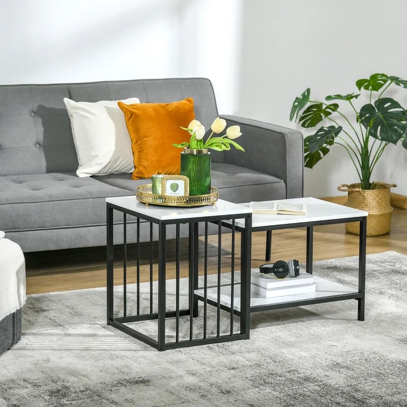 Living room with a gray sofa, coffee table, and decorative items.