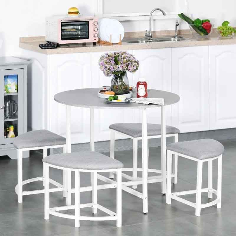 Kitchen table set with four stools in a modern kitchen.