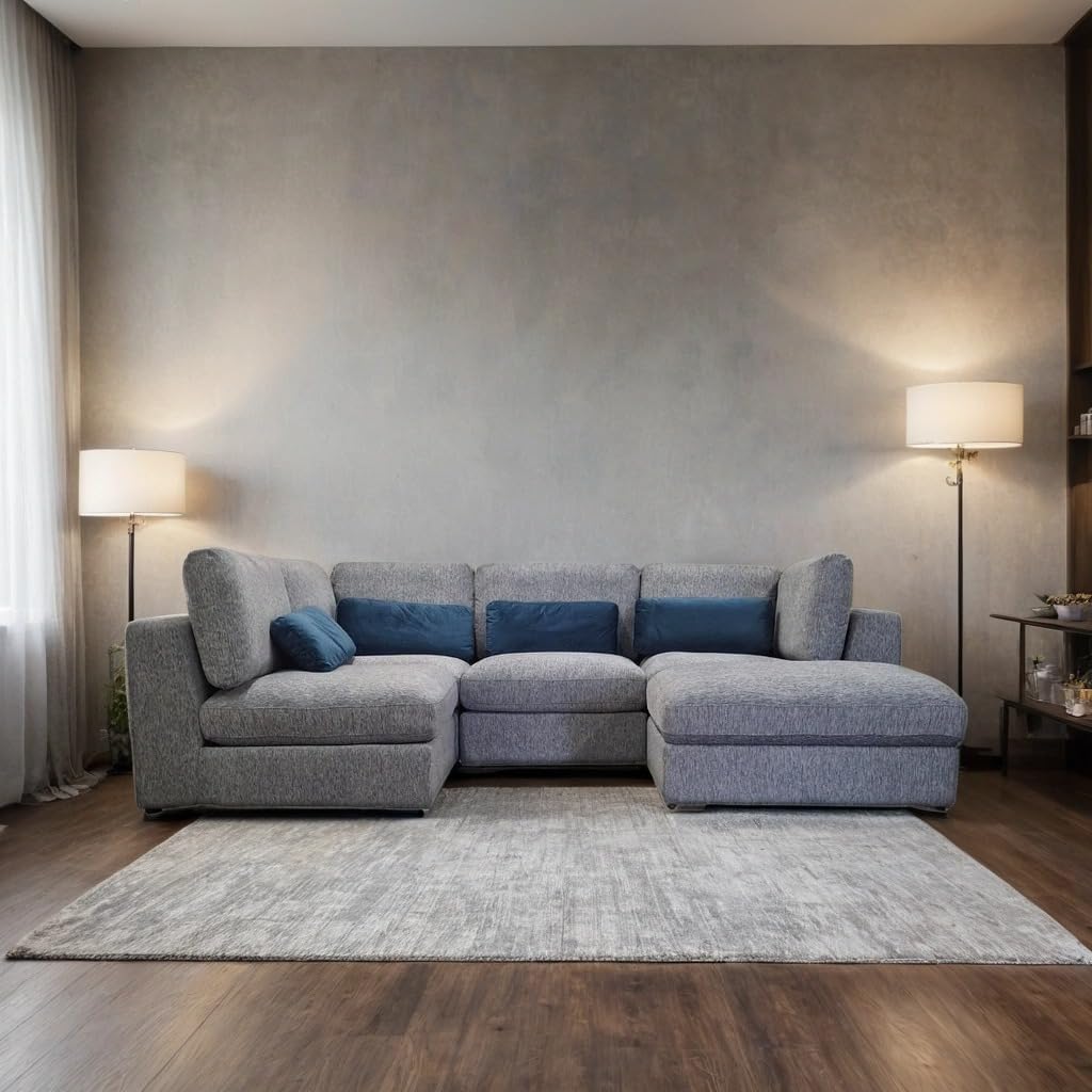 Gray sectional sofa in a living room with a neutral color scheme