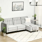 Gray sectional sofa in a living room setting with a cityscape painting on the wall.