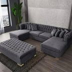 Gray sectional sofa with ottoman in a living room setting