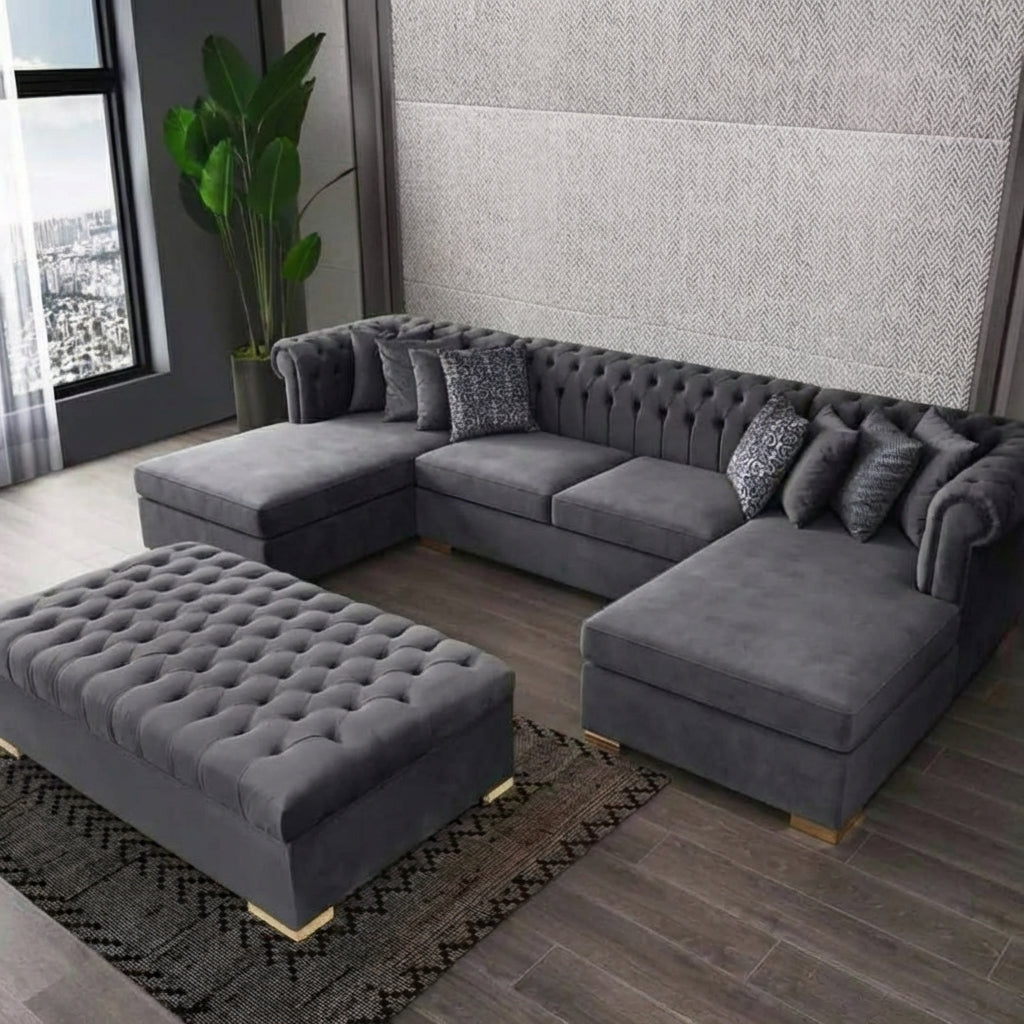 Gray sectional sofa with ottoman in a living room setting