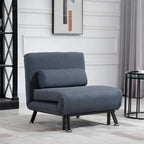 Gray armchair in a room with a white wall and decorative elements.