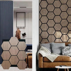 Hexagonal wooden wall panels in a modern interior setting with a sofa and decor.