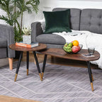 Living room with gray sofa, wooden coffee table, and decorative items.