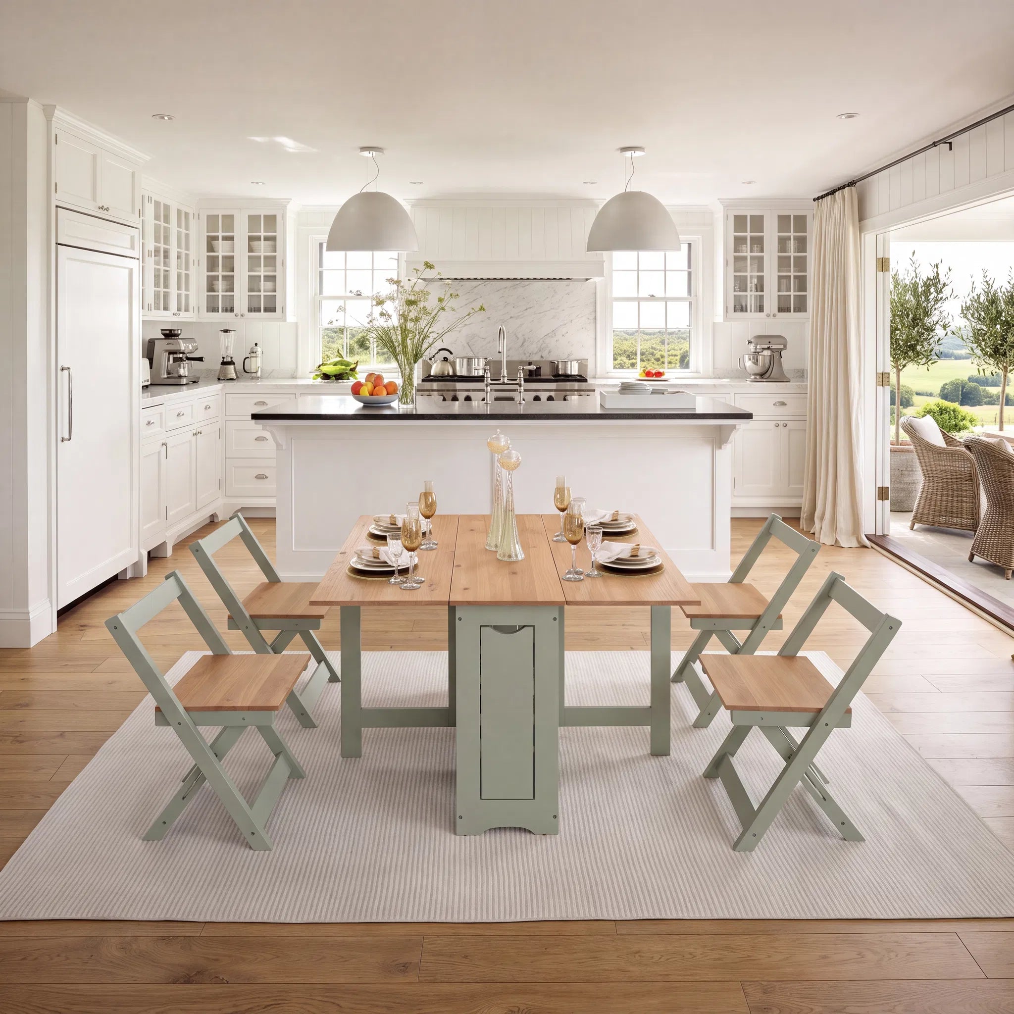 A dining set consisting of a rectangular light wood table and four matching folding chairs in a sage green finish, set on a white textured area rug in a bright, modern kitchen.