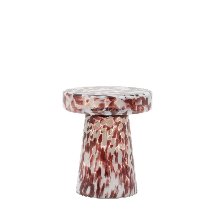 Marbled red and white cylindrical object on a white background