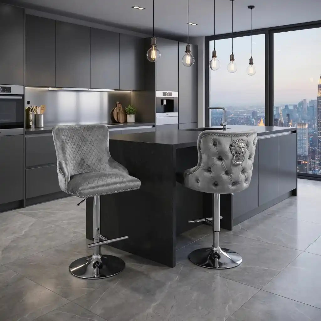Modern kitchen with gray bar stools and a cityscape view.