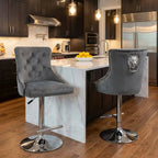 Modern kitchen with marble island and gray bar stools