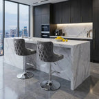 Modern kitchen with marble island and stools, cityscape view