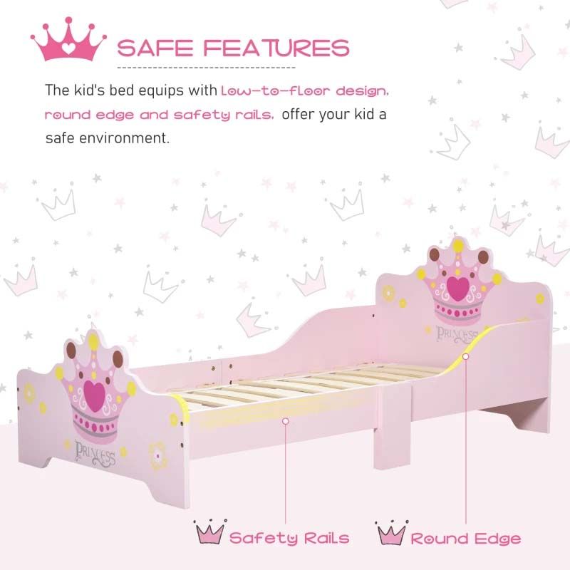 Pink children's bed with safety features on a white background