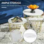 Round white table with gold legs on a textured surface, featuring a bowl of oranges and books.