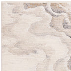 Textured area rug with a neutral color palette on a plain background