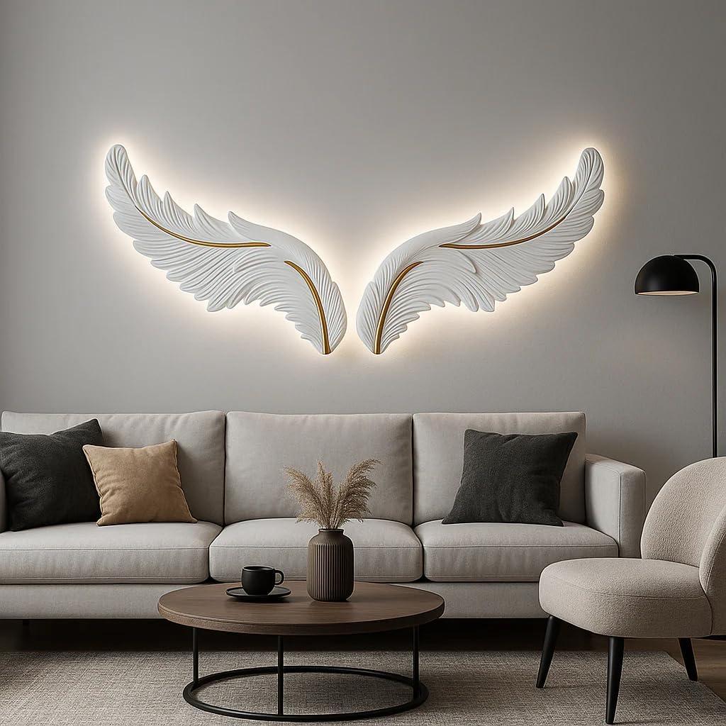 Modern living room with a large feather wall sculpture, gray sofa, and round coffee table.