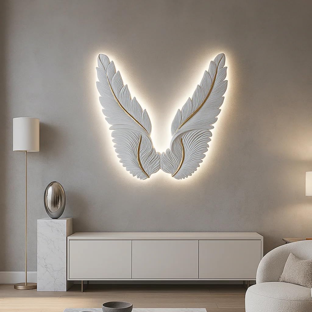 Decorative wall sculpture of angel wings with LED lighting in a modern living room.