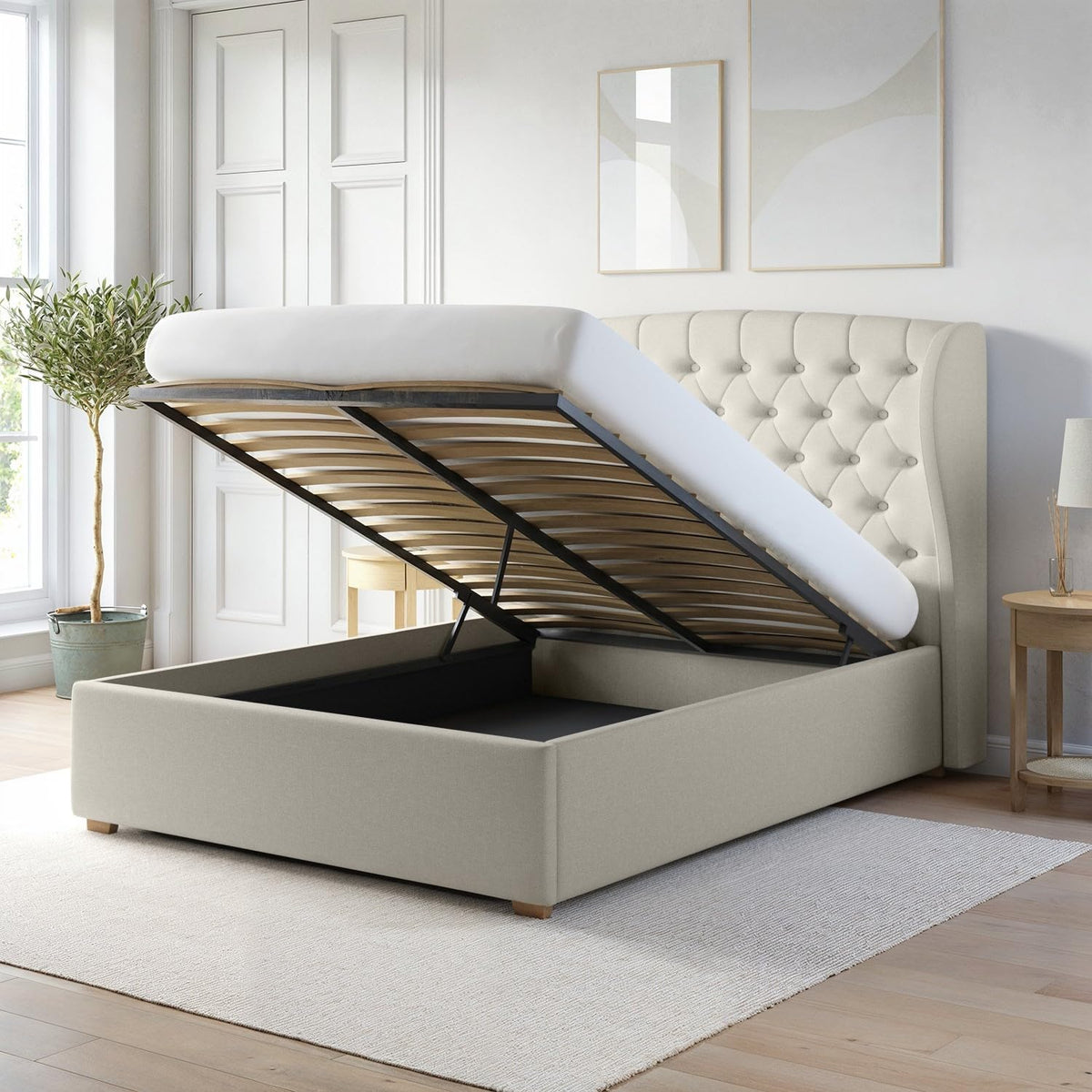 Beige upholstered bed with storage compartment in a bright room