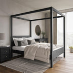Modern bedroom with a black canopy bed, white bedding, and wooden flooring.