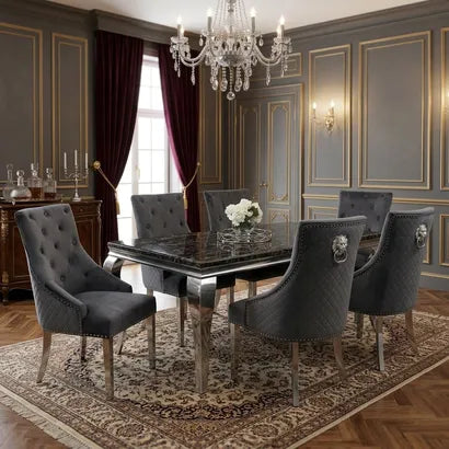 A luxury dining set featuring a rectangular marble-top table with gold legs and six matching tufted upholstered chairs, styled in a modern dining room.