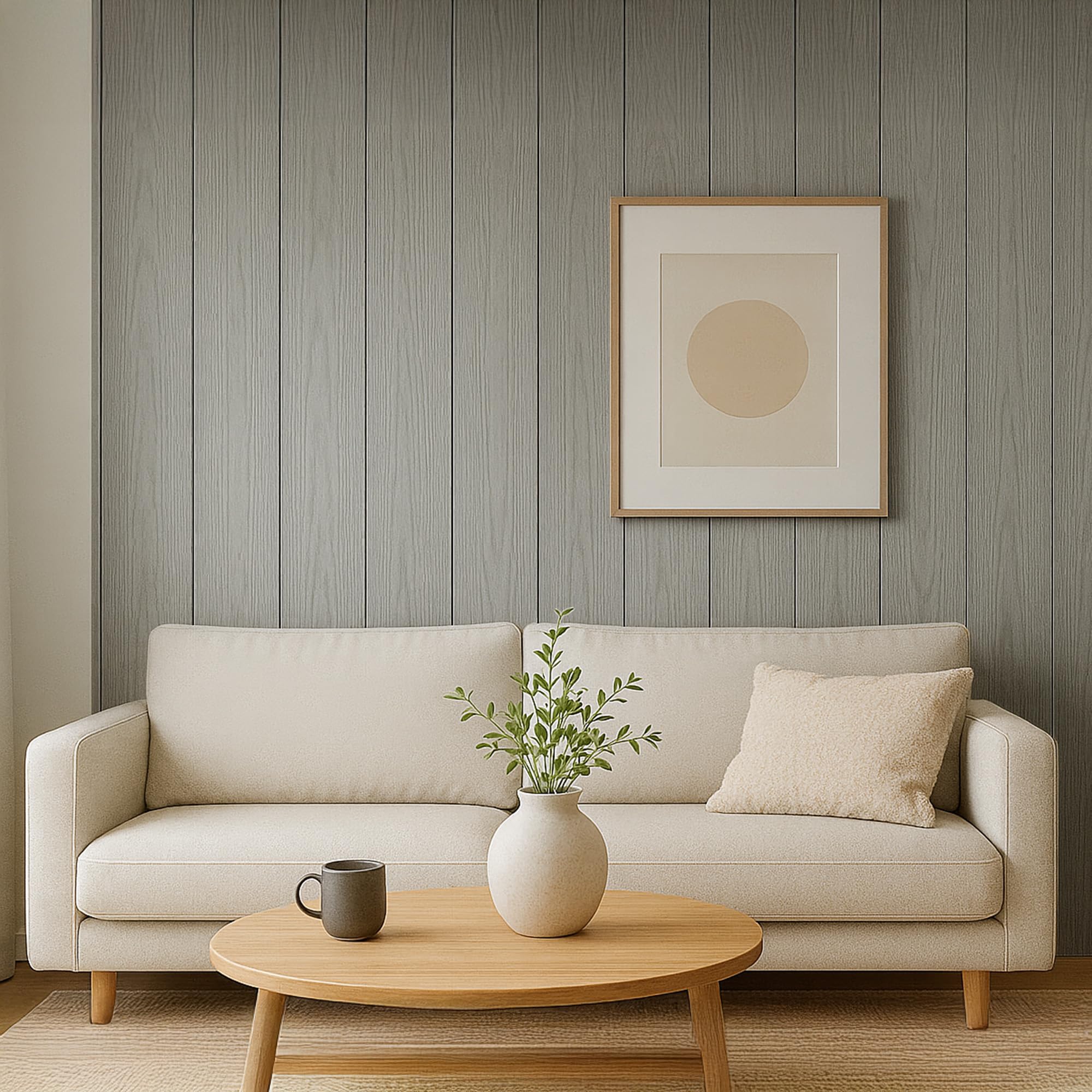 Beige sofa in a living room with a wooden coffee table, vase, and abstract art on the wall.