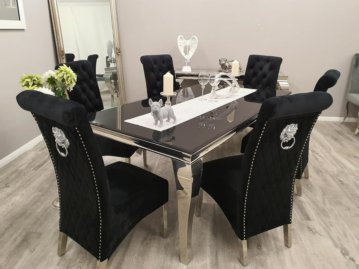 Dining table set with black chairs in a room setting