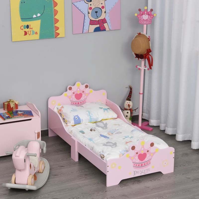 Children's bedroom with a pink bed, rocking horse, and toys.