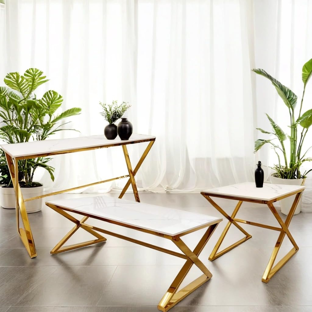 Modern living room with gold-finished coffee table, bench, and side table against white curtains.