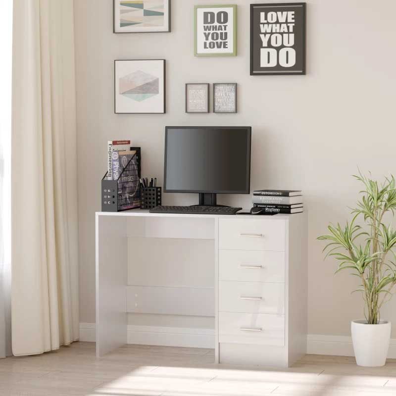 Modern home office with a white desk, computer monitor, and decorative elements.