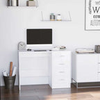 Modern office setup with a white desk, computer monitor, and shelves.
