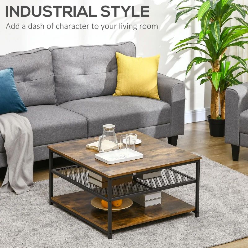 Gray sofa with yellow pillow and wooden coffee table in a living room setting.